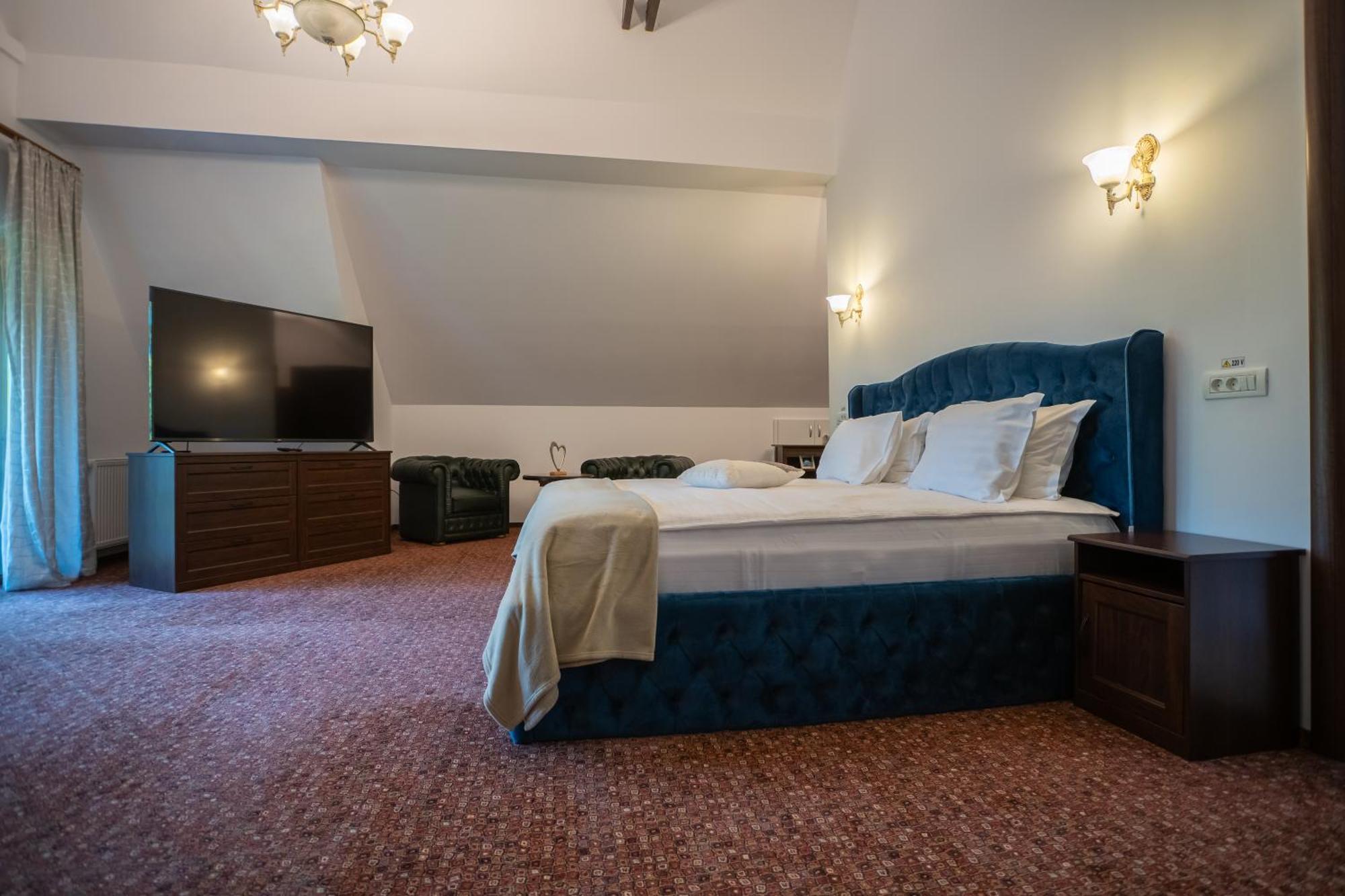 Opus Villa Sinaia Buitenkant foto A bedroom at the hotel