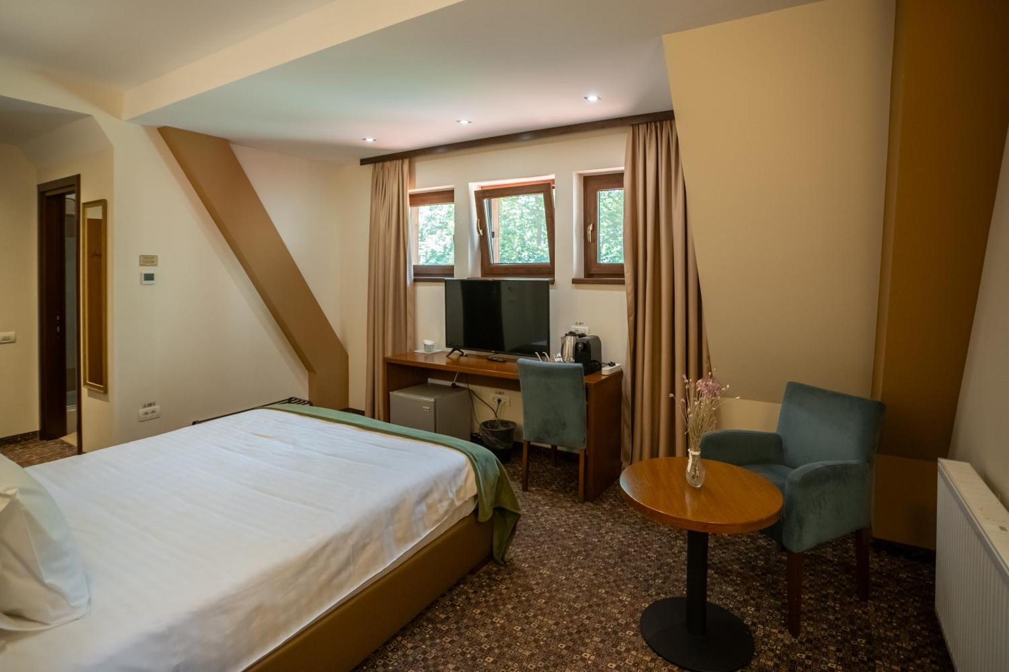 Opus Villa Sinaia Buitenkant foto A room at the hotel